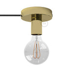 Spostaluce, der Lichtpunkt aus Metall mit Textilkabel und seitlichen Öffnungen – Messing